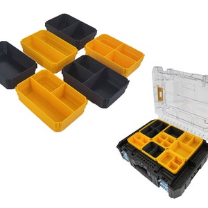 May include: A set of six black and yellow plastic storage containers with dividers. The containers are designed to fit into a larger storage box, which is also shown in the image. The larger box is black with a clear lid.