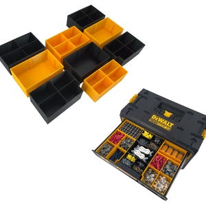 May include: A black and yellow DeWalt ToughSystem 2.0 toolbox with a drawer open, revealing a variety of small parts and tools organized in compartments. The toolbox is surrounded by smaller black and yellow storage containers.