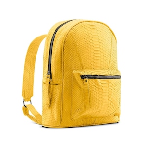 May include: A yellow snakeskin backpack with a zippered front pocket.