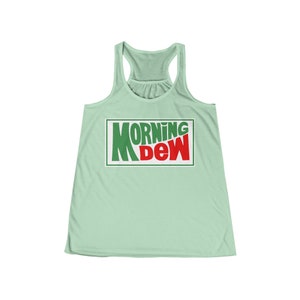 May include: A light green tank top with a white rectangle containing the words "MORNING DEW" in green and red letters.