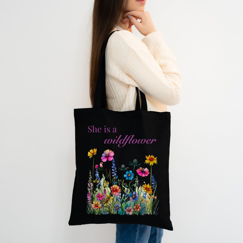 She is a wildflower, The Daisy Exchange, Gifts for her, bestie gifts, birthday gifts, best selling items, bridesmaid tote, embroidered tote, floral backpack, weekend bag, christian tote, farmers market bag, floral botanical canvas bag, everyday tote