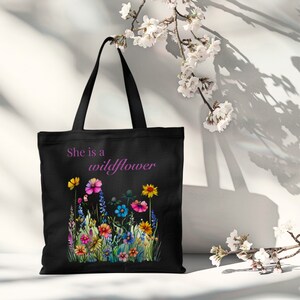 She is a wildflower, The Daisy Exchange, Gifts for her, bestie gifts, birthday gifts, best selling items, bridesmaid tote, embroidered tote, floral backpack, weekend bag, christian tote, farmers market bag, floral botanical canvas bag, everyday tote