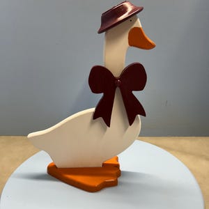 Wooden Goose Shelf Sitter with Hat and Bow Centerpiece