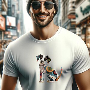 May include: A white t-shirt with a colorful, patterned dog illustration on the front. The dog is sitting with its head tilted to the side and has a black and white face.