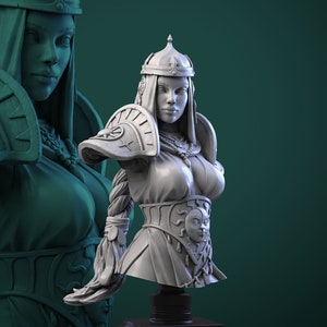 Puede incluir: Un busto de mujer pintado de blanco, con una corona y armadura. El busto está sobre una base negra. El fondo es de color verde oscuro. El texto "Vasilisa bust" está en la parte inferior de la imagen.