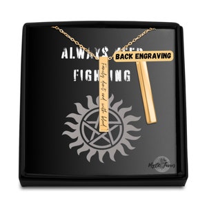 May include: Gold necklace with a bar pendant that reads "Family don't end with blood." The back of the pendant is blank for engraving. The necklace is in a black box with a silver symbol and the words "Always Keep Fighting."
