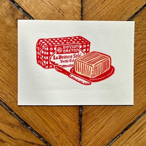 Handskuret linoleumsnitt: Illustration av franskt saltat smör (A6)