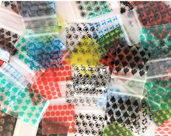 100pc mini ziplock baggies, 1.5" x 1.5"  Standard dime bag size. WE CHOOSE 10+ random mix assorted patterns. Explore rare & vintage styles