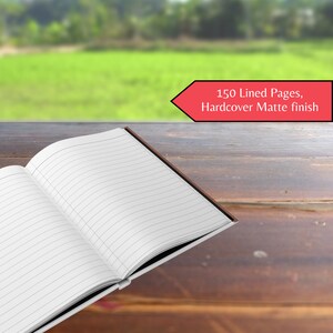 May include: An open lined journal with a brown hardcover and a matte finish. The journal has 150 lined pages.