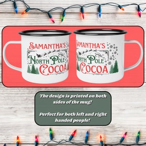 May include: White enamel mug with a black rim and handle. The mug has a Christmas design with the text "Samantha's North Pole Cocoa" printed on both sides.