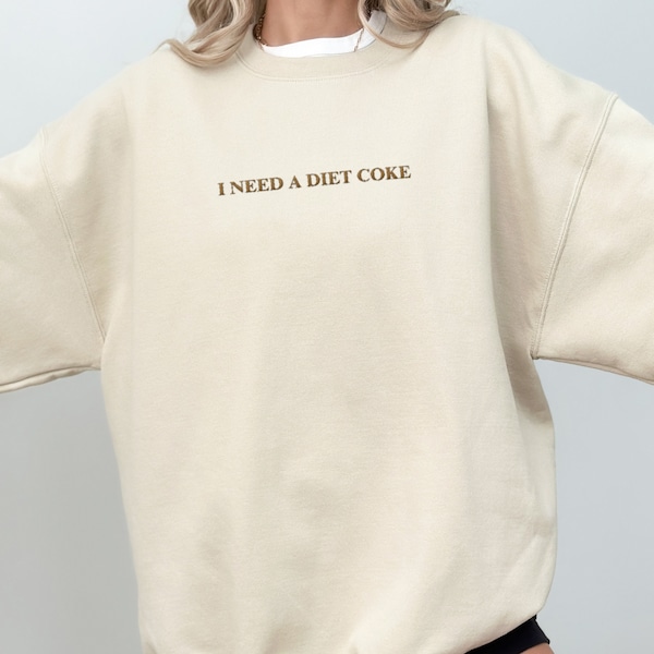 i need a diet coke embroidered unisex sweatshirt