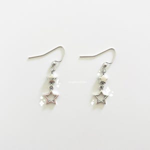 y2k silver star earrings | stary whimsygothic space earrings | edgy punk star charm hoops | cyber grunge dangly star charm jewelry | gifts