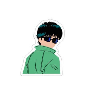 May include: A sticker featuring a stylized illustration of a person wearing sunglasses and a green jacket, looking over their shoulder. The person has black hair with teal highlights. The sunglasses have blue lenses.