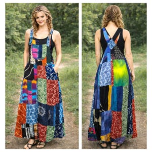 May include: A patchwork maxi dress featuring a variety of colorful fabric squares. The dress has a black top and adjustable straps. The dress has pockets and is worn with sandals. The dress is a bohemian style.