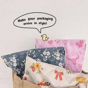 May include: A burlap tote bag filled with three different patterned mailing envelopes. The envelopes are decorated with floral, geometric, and animal print designs. A speech bubble above the bag reads "Make your packaging arrive in style!" with a yellow rubber ducky inside.