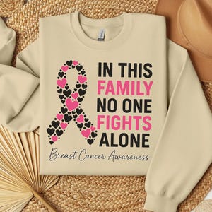 In This Family No One Fights Alone Breast Cancer Sweatshirt, Breast Cancer Awareness Ribbon Shirt, October Pink Ribbon Tee, Fighters Gifts