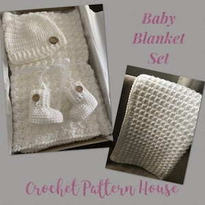 May include: A white crocheted baby blanket set, including a blanket, hat, and booties. The set is packaged in a white box and labelled "Baby Blanket Set".