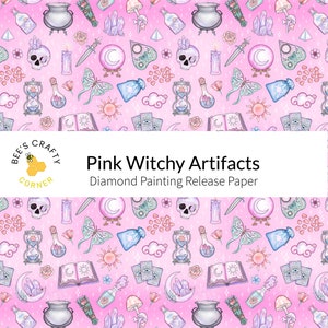 May include: A pink background with a repeating pattern of witchy artifacts, including a cauldron, a skull, a crystal, a book, a moon, a butterfly, a sun, a potion bottle, a dagger, a candle, a tarot card, a bag, a cloud, an hourglass, and a mushroom. The text "Pink Witchy Artifacts" and "Diamond Painting Release Paper" is at the bottom of the image.
