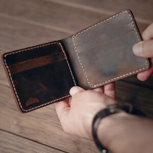 Cartera plegable de cuero