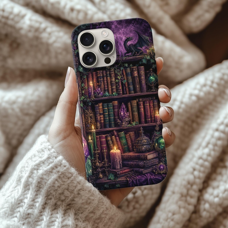 iPhone case with a dark fantasy design of a dragon atop bookshelves and glowing candles.