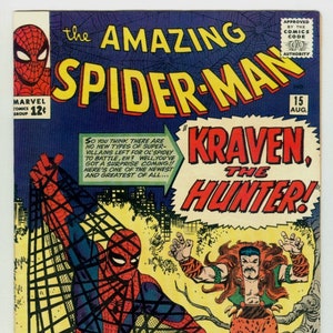 Pode incluir: Uma capa de banda desenhada com o Homem-Aranha num fato vermelho e azul, a balançar-se numa teia. Ele está a enfrentar Kraven o Caçador, um homem grande e musculoso com um cinto de pele de leopardo. O texto da capa diz "The Amazing Spider-Man" e "Kraven, the Hunter!"