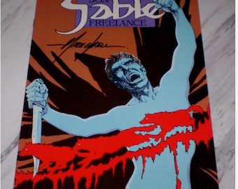 Jon Sable Freelance #35 NM 9.4 White pages 1986 First Comics Signed by MIKE GRELL Copper Age Comics Book