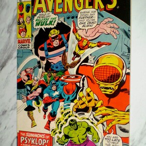 May include: A vintage Marvel comic book, The Avengers issue 88, featuring a colorful cover illustration of superheroes including Hulk, Thor, and Captain America battling a yellow-skinned alien entity with a large, grid-patterned helmet.
