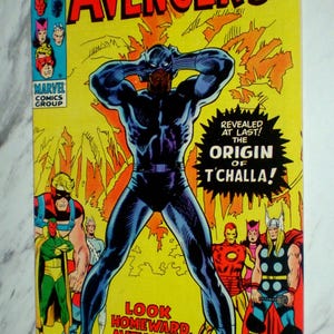 May include: A vintage Marvel comic book titled The Avengers number 87, featuring a yellow cover with Black Panther in the center. The text reads Revealed at last! The origin of T'Challa! and Look homeward, Avenger! with other heroes depicted.