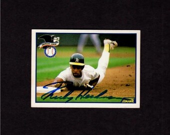 1990 Topps #7 Record Breaker Rickey Henderson (HOF) Signed - AUTOGRAPHED MLB Leaders Baseball card