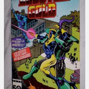 May include: A vintage comic book cover featuring Booster Gold in action. The cover art showcases a dynamic scene with vibrant colors, including yellow, blue, and green. Text includes "Booster Gold", "Mindancer", and "Before Skeets is Destroyed?!"