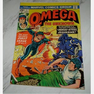 May include: A vintage Marvel Comics comic book, "Omega the Unknown". The cover shows a superhero in a red cape fighting a blue robot. Text includes "The Most Fantastic First Issue of All!!".