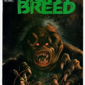 May include: Comic book cover for Clive Barker's Nightbreed #4. The cover features a monstrous creature with red eyes, sharp teeth, and claws. The title is in large green letters. The background is dark.