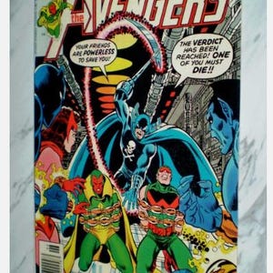 May include: Vintage comic book cover of The Avengers #160. The cover features a dynamic illustration of several costumed superheroes in action, with the title "The Avengers" prominently displayed. The cover includes text bubbles with phrases like "The Verdict Has Been Reached! One of You Must Die!!"