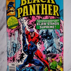 May include: A 1979 Marvel Comics Group Black Panther comic book featuring a cover illustration of Black Panther fighting Klaw, with text including The Black Panther, An All-New Panther Epic, and Surrounded by an Impenetrable Wall of Solid Sound.