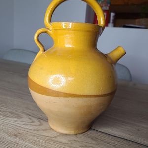 Old glazed terracotta water jug.
