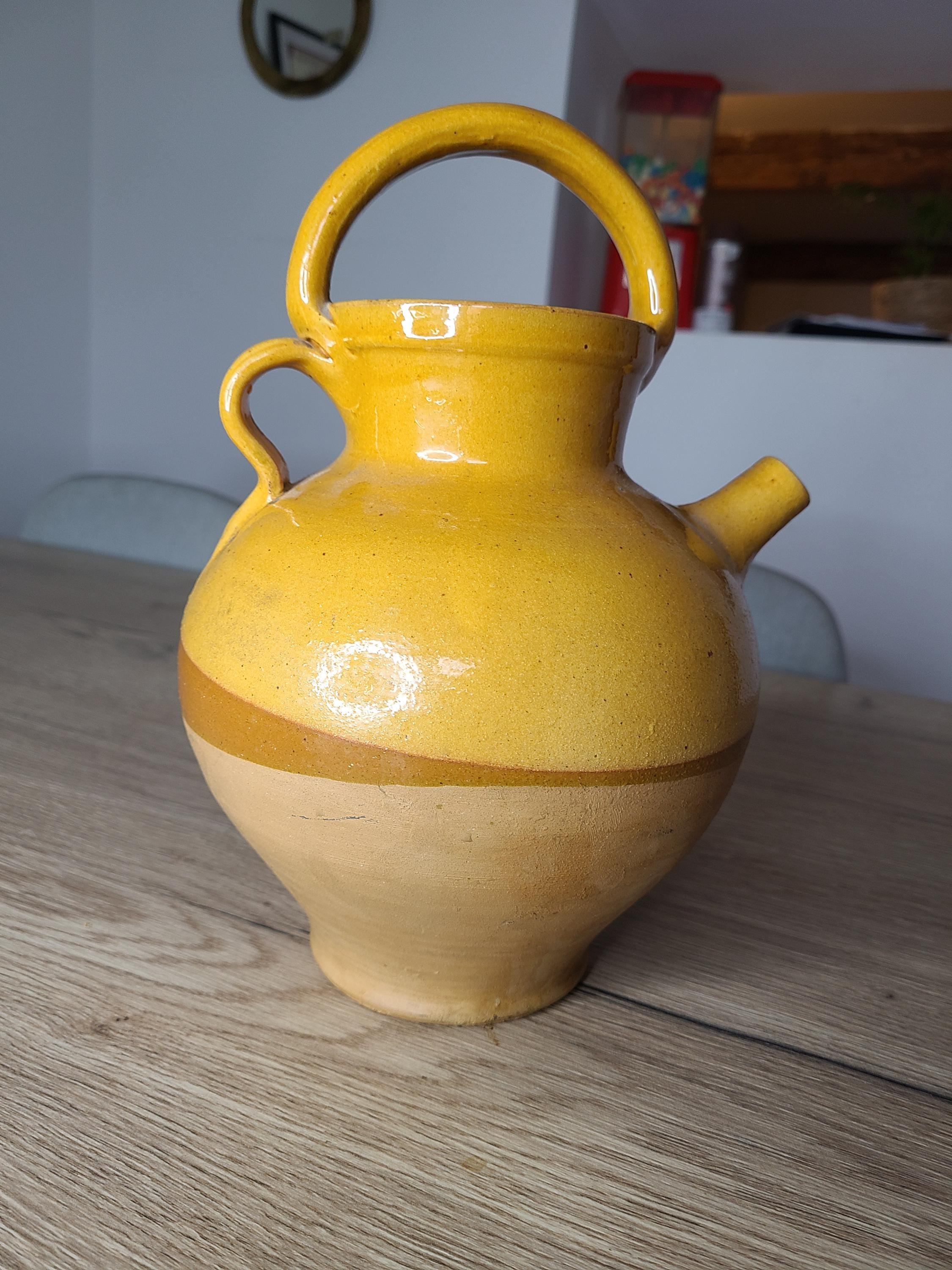 Old glazed terracotta water jug.