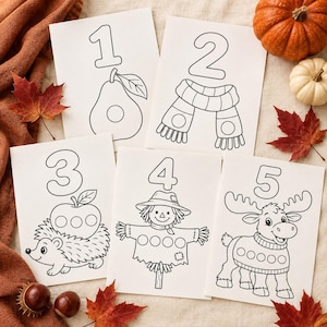 May include: Five white rectangular colouring pages featuring black line art of numbers one through five. Each page displays a corresponding illustration: a pear, a scarf, a hedgehog with an apple, a scarecrow, and a moose wearing a sweater.