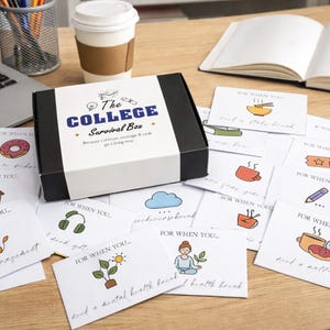 May include: A black and white rectangular box labeled The College Survival Box with a white sleeve, surrounded by multiple white cards featuring colorful illustrations and the text For When You, including icons of food, drinks, and nature.