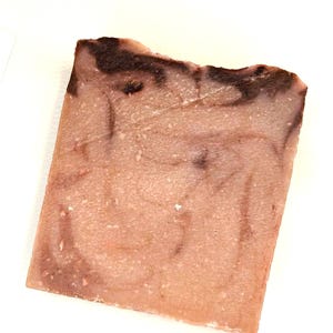 May include: A rustic wooden sign with the text "Welcome to our home" in white lettering. The sign features a distressed finish and a simple, inviting design, perfect for a front porch or entryway.