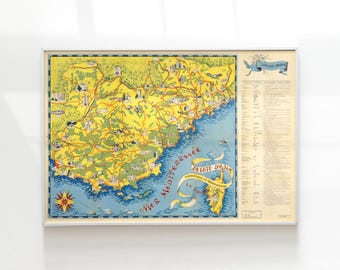 May include: Framed vintage map of the French Riviera, featuring a detailed illustration of the coastline with yellow, blue, and green hues. The map includes the text "Mer Méditerranée" and "La Cote D'Azur".