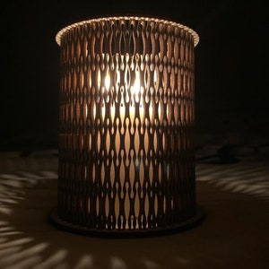Project for a unique design cylindrical candle holder to be made by laser