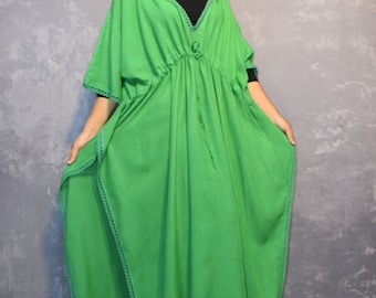 May include: A bright green kaftan with a drawstring waist and lace trim. The kaftan is made of a lightweight fabric and is perfect for warm weather.