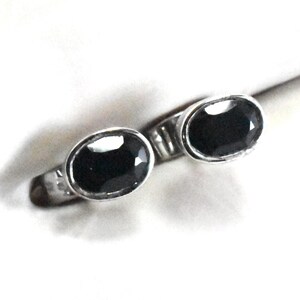Minimalist silver stud earring with natural black onyx