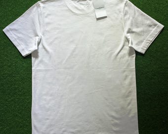 ■Casablanca■大人気 ユニセックス ホワイトTシャツ 国内発送 カブトヌシTシャツ 白 ユニセックス S.M.L.XL スタジオ黒木