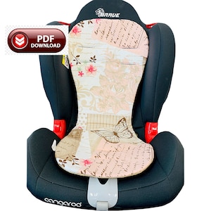 Könnte beinhalten: Schwarzer Autositz mit einem gemusterten Einsatz mit Schmetterling, Blumen und Schrift. Der Sitz hat rote Akzente und das Wort "BRAVE" auf der Kopfstütze. Der Sitz ist mit "cangaroo" beschriftet. Ein PDF-Download-Symbol ist sichtbar.