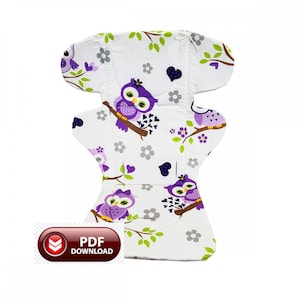 May include: White reusable cloth menstrual pad with a whimsical owl print. The pad features purple owls perched on brown branches with green leaves and gray flowers. The pad has a unique shape with wings and a PDF download button.