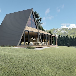 Puede incluir: Una casa moderna de forma triangular con grandes ventanales y una terraza de madera. La casa est&aacute; situada en una colina cubierta de hierba con vistas a un lago y monta&ntilde;as en la distancia.