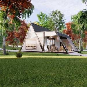 Pode incluir: Uma casa moderna de forma triangular com grandes janelas, cercada por &aacute;rvores e um gramado. A casa tem um exterior de madeira e um telhado preto.