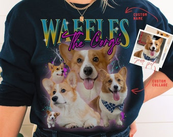 Może przedstawiać: Granatowa bluza z kolorową grafiką przedstawiającą corgi i tekstem "Waffles the Corgi". Grafika zawiera wzór błyskawicy i kolorowe plamy farby. Bluza ma miejsce na spersonalizowane imię i spersonalizowany kolaż zdjęć.