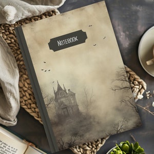 May include: A vintage-style notebook with a spooky, foggy image of a gothic mansion on the cover. The cover has a brown background with a black title that reads "Notebook".